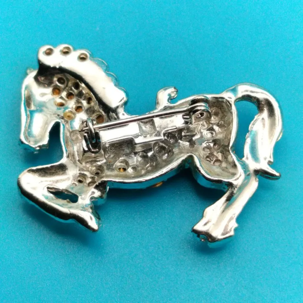 Vintage Rhinestone Horse Brooch Pin Silver Tone Clear Red Eye Equestrian Jewelry
